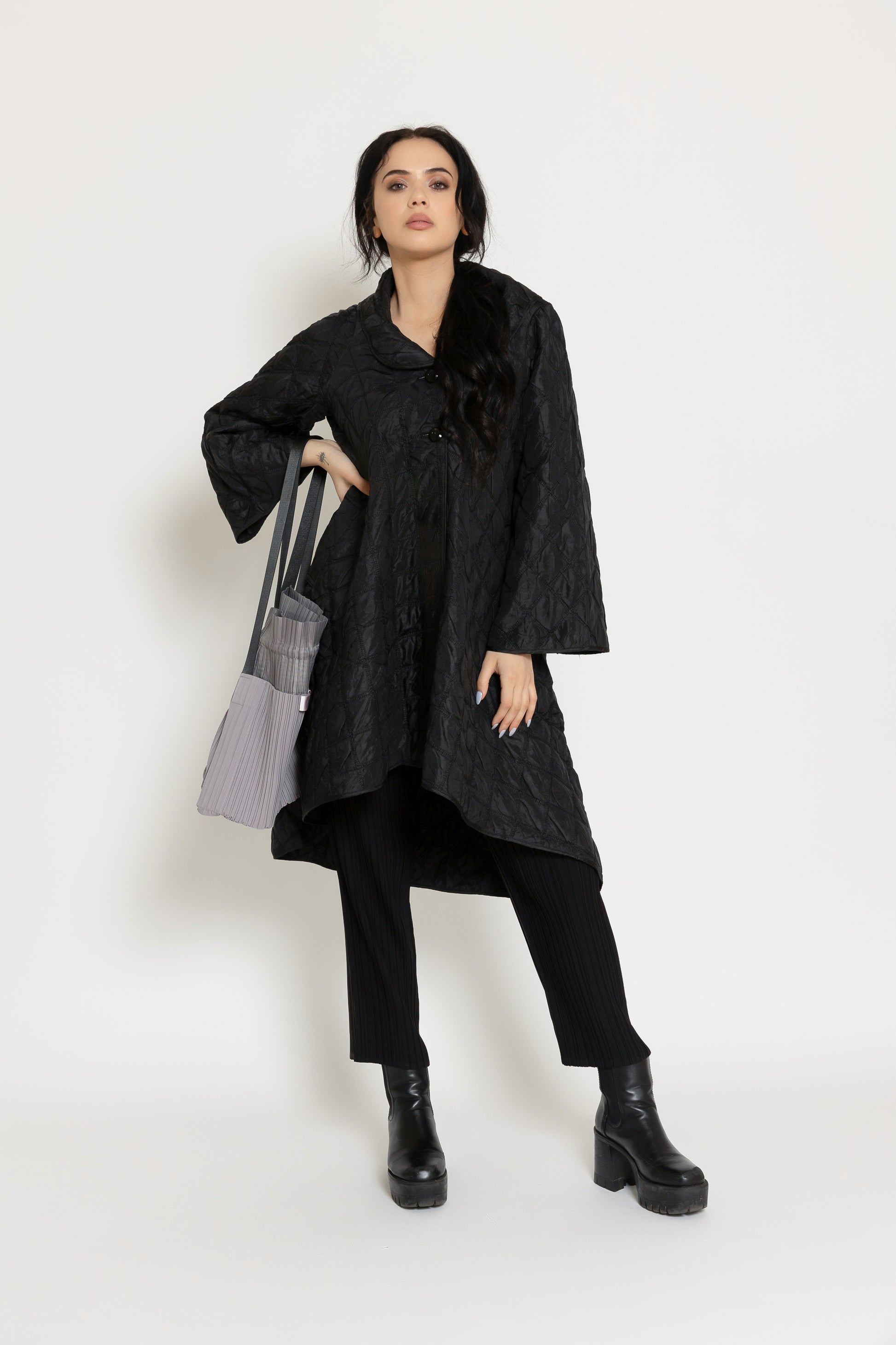 A model wearing the Marie Coat.