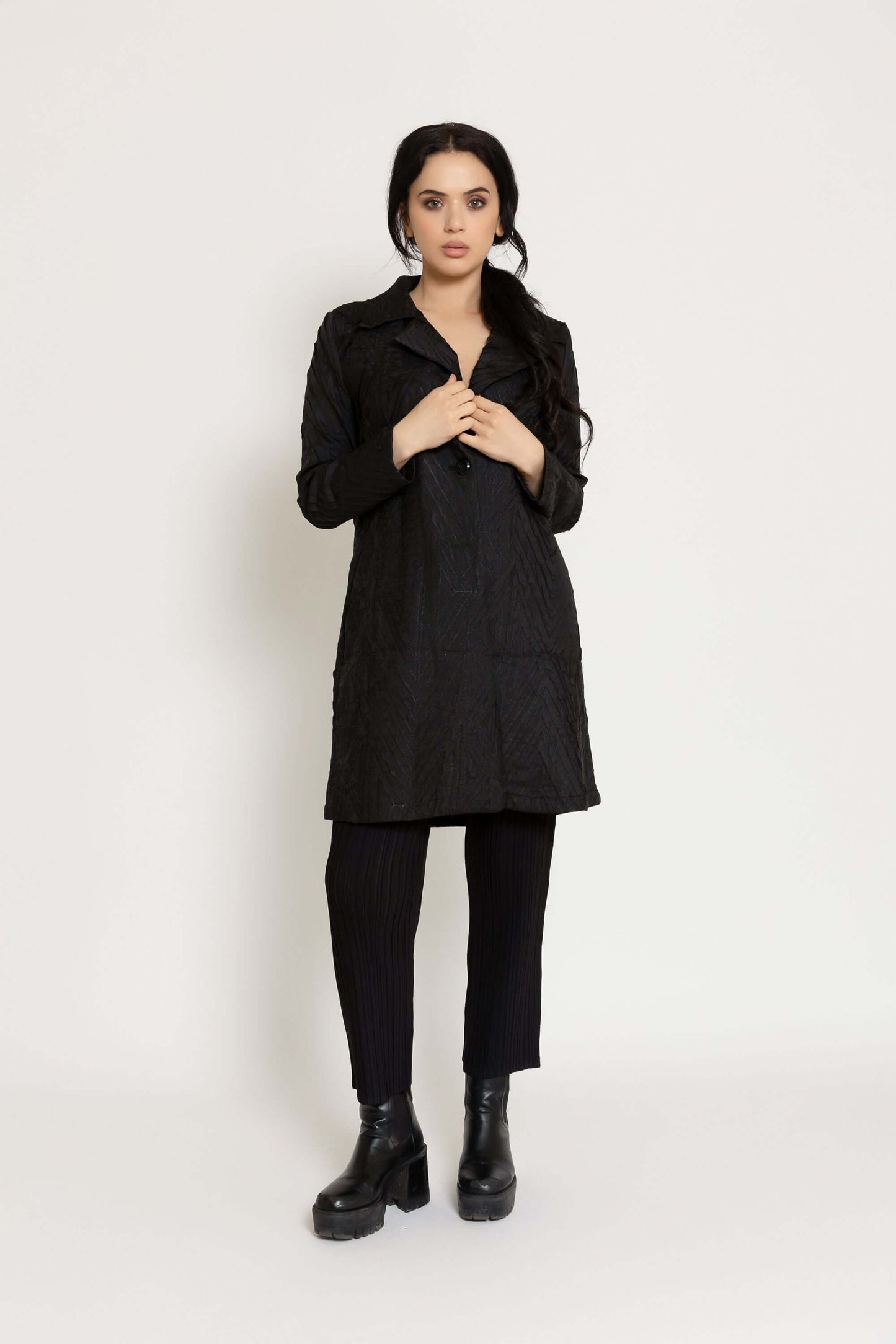 A model wearing a Genevieve coat