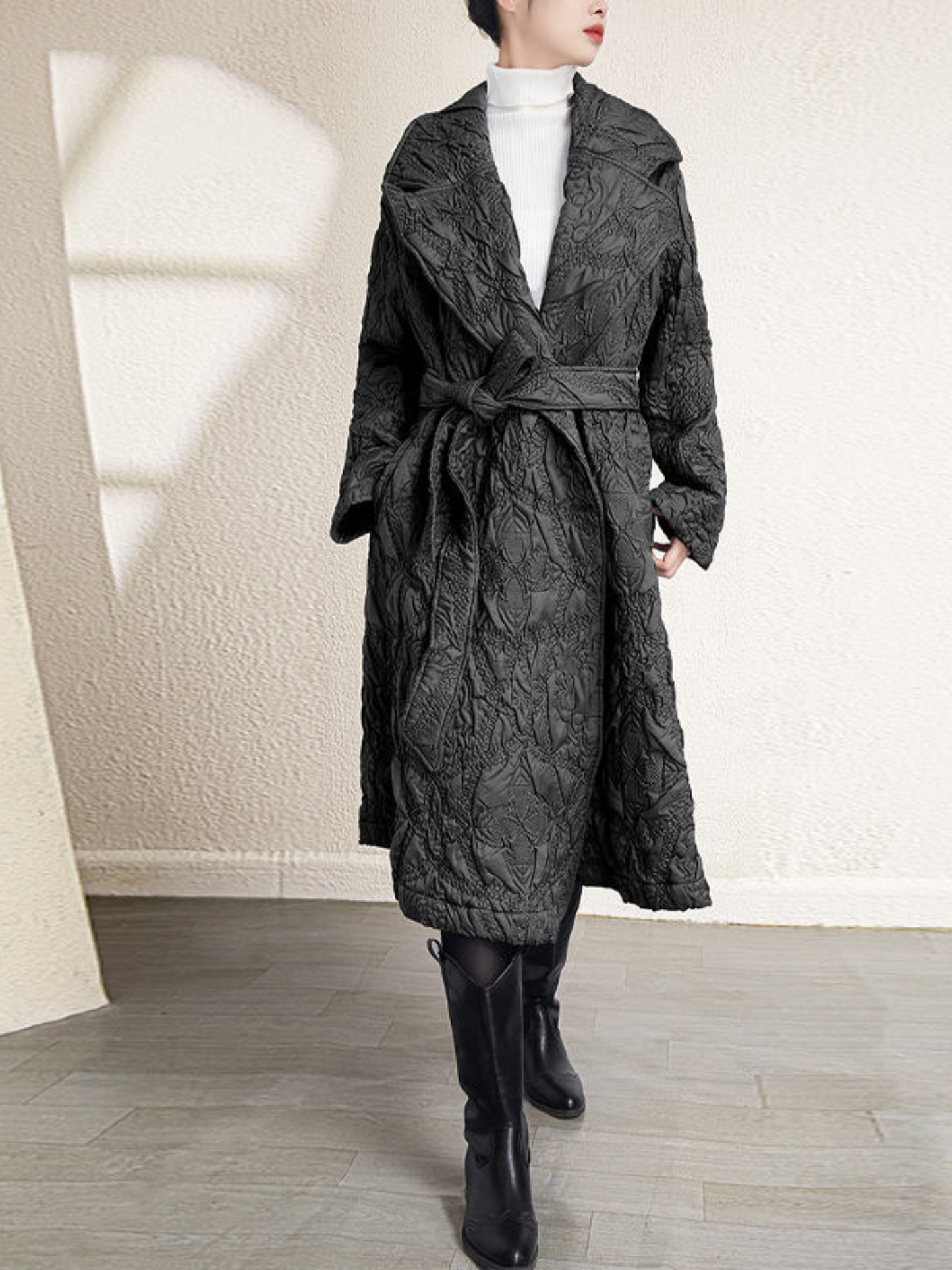 A model wearing the Monarch Coat.