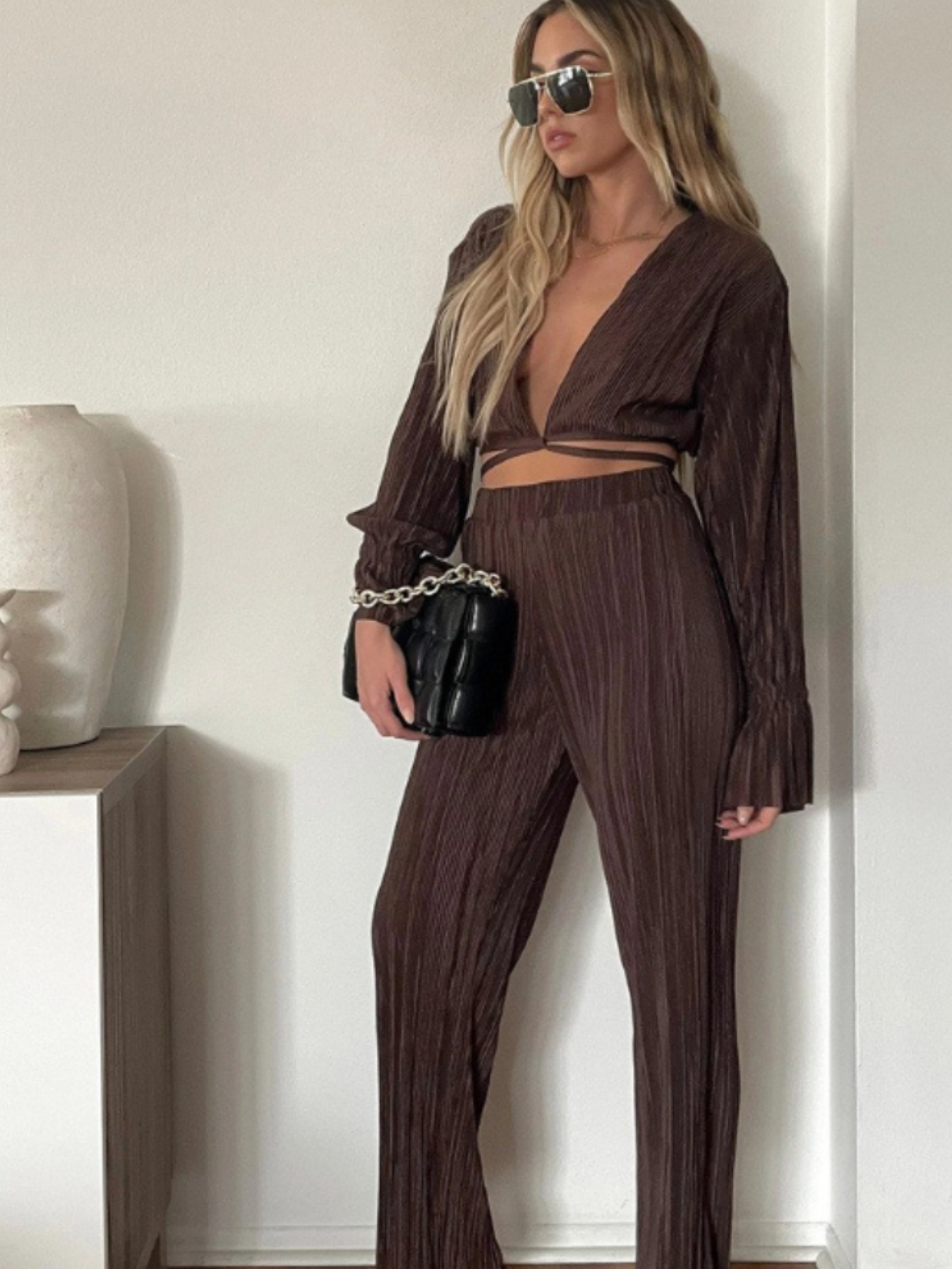 A model wearing the Mocha Pants.