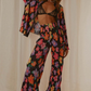 A model wearing the Flora Pants.