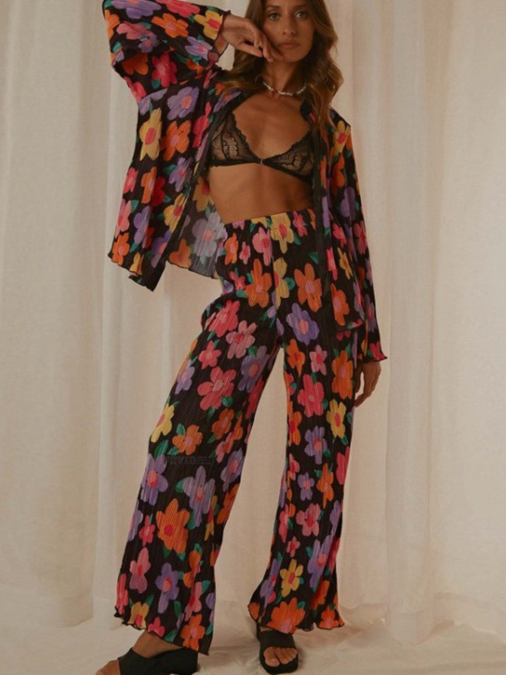 A model wearing the Flora Pants.