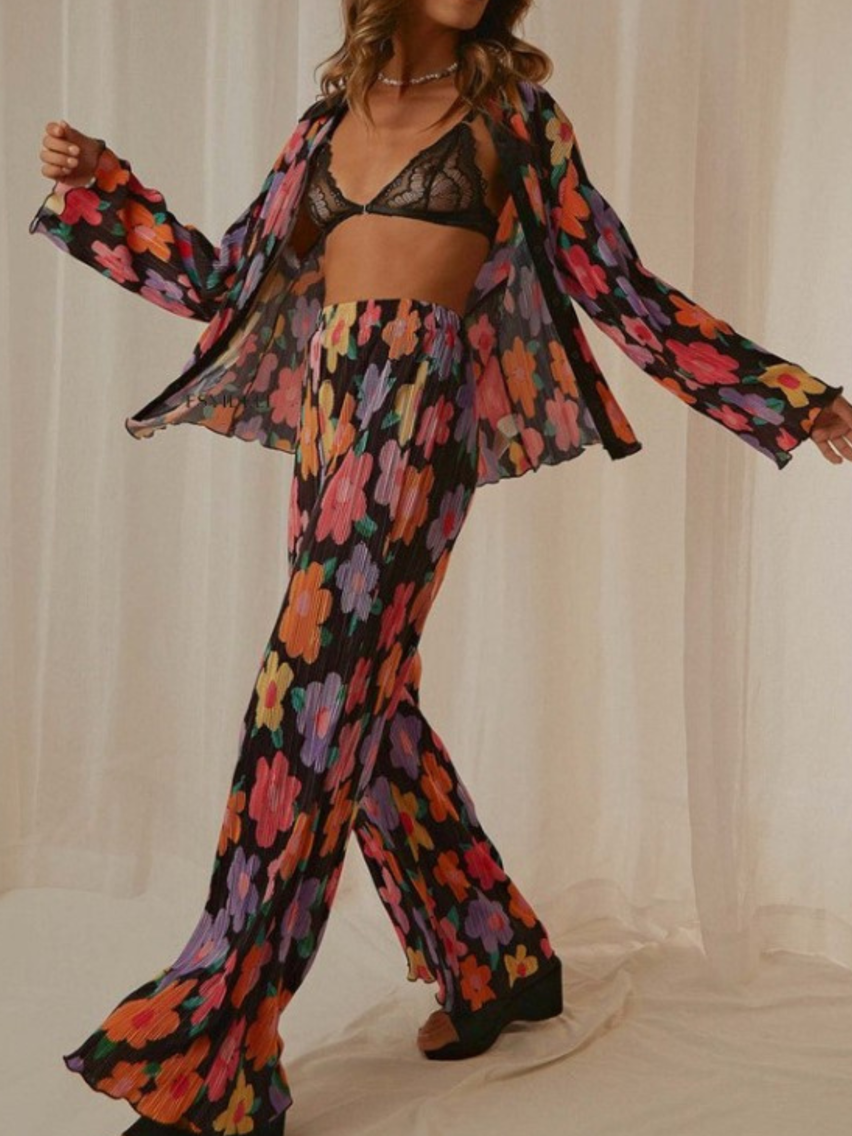 A model wearing the Flora Pants.