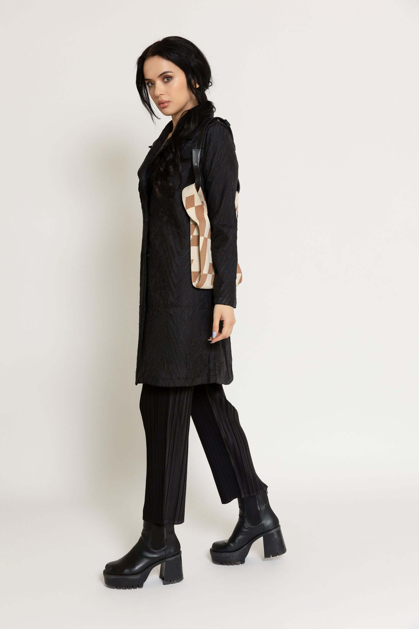 A model wearing a Genevieve coat